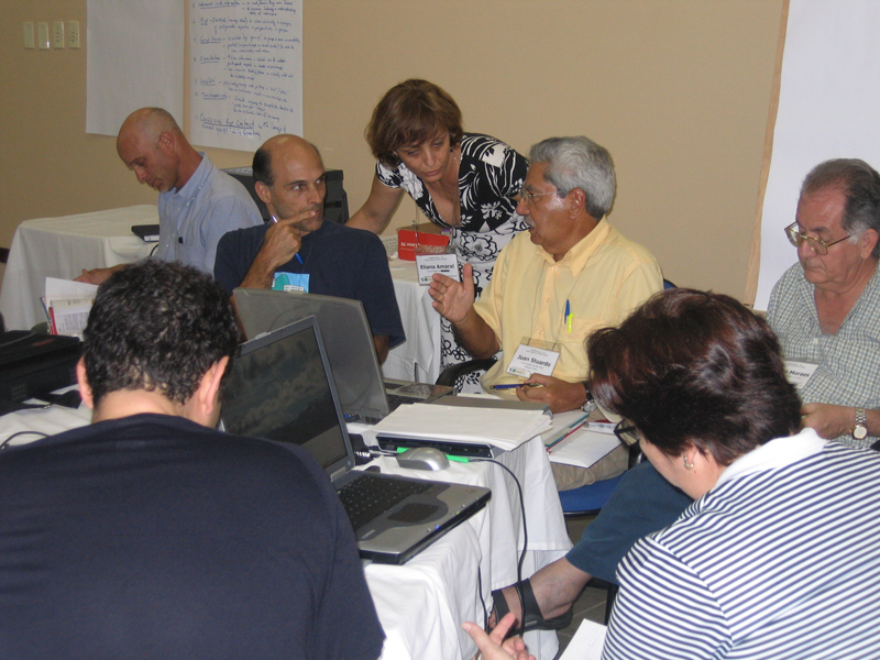 Brazil-FAIMER Regional Institute Co-Director Eliana Amaral chatting with Fellows